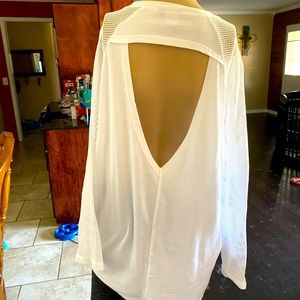 White cute long sleeve with back cut out. Like new